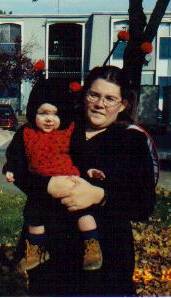 Zoe's 1st Halloween Mommy and Zoe are ladybugs.  8 Months old