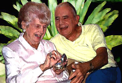 elderly man and woman laughing