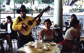 /At the zócalo listening to 'Cafe Caliente's' music.