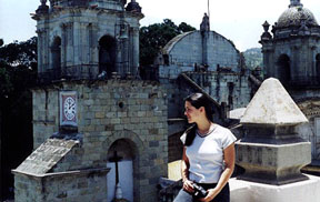 Robin on the rooftop of the hotel Marques del Valle. Behind her is Oaxaca's cathedral.