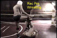 Alex Carr plants a boot to the midsection.
