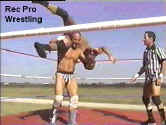 Brick tries a different backbreaker.