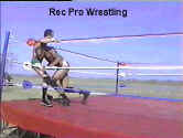 Holiday recovers and sends his opponent into a corner.