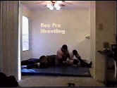 Larry caught in a side headlock