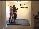 llRiley eventually recovers and gains the upper hand with a hammerlock.