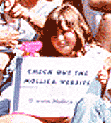 Ginny with Mollica.net web sign