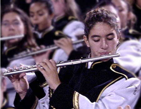 Annalisa played the flute in her high school marching band. She has since graduated.