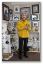 Kyung Hatfield in the Alberta House shop with a Rick Shapero vase (photo courtesy of Dave Bigelow). Click for a larger version.