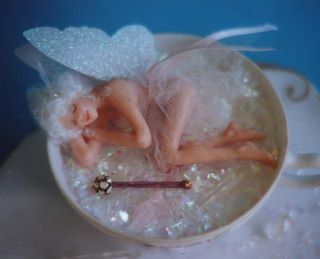 Teacup fairy, one of a set of four, by Helen Bush