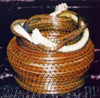 Pine needle basket with antler trim by Janet Bonnell.  Click for a larger version.