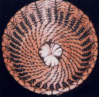 Pine needle basket with sea shells by Janet Bonnell.  Click for a larger version.