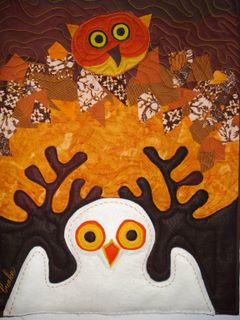 Textile art from "Endangered Species" by Jean Burke.