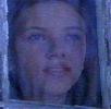 Grace looking through window