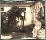 Reading on the terrace by the old well house